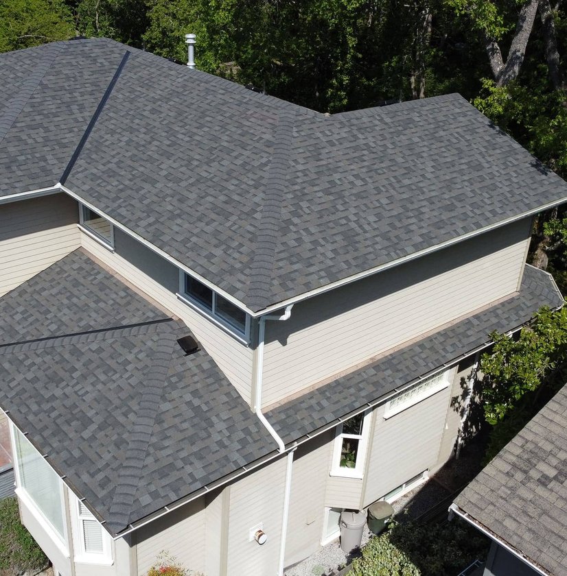 Asphalt shingle roof replacement project by McGuire Roofing