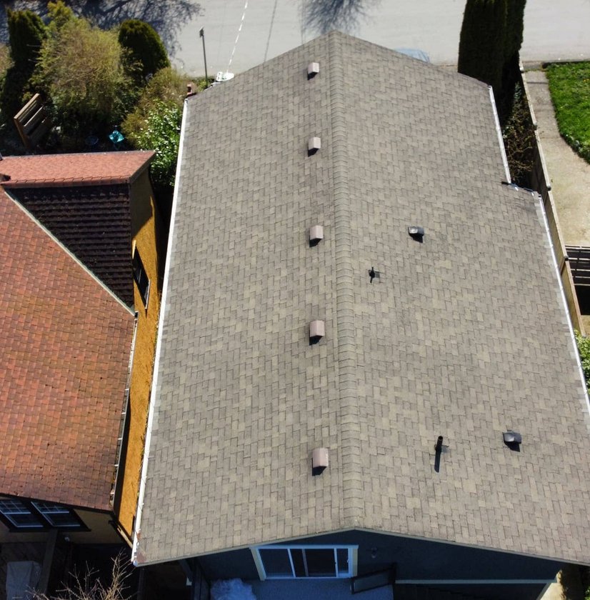 New asphalt shingle roof by McGuire Roofing
